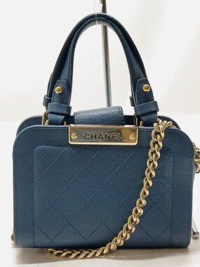 CHANEL Grained Calfskin Stitched Mini Label Click Shopper Blue